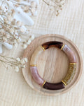 Bracelet perles tube Marie tons terracotta marron glitter sur support en bois Créations bijoux la Tête dans les Nétoiles 