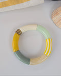Bracelet perles tube Mona jaune et vert à rayures . Création La Tête dans les Nétoiles